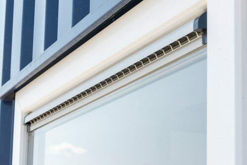 Fixed glass window frames with ventilation grille